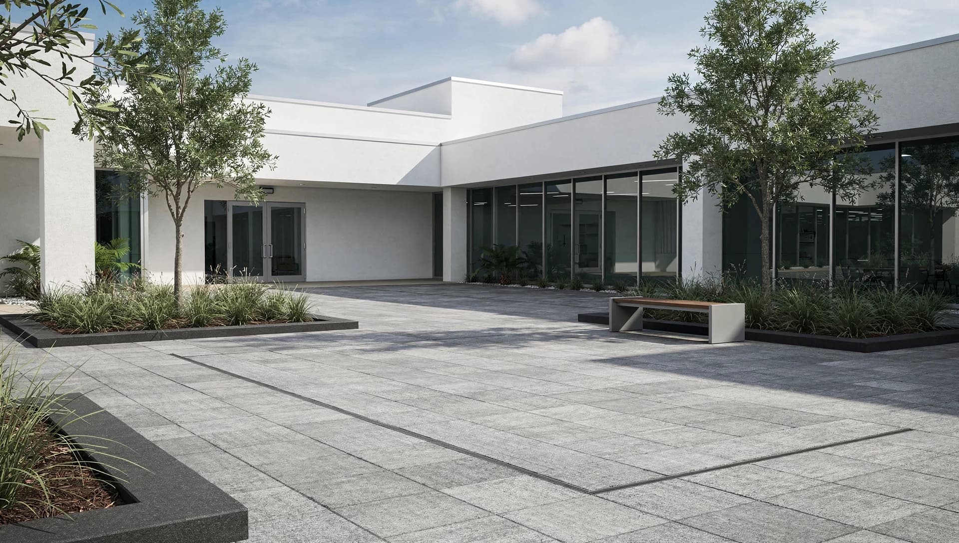 Gray paved courtyard beside contemporary Florida offices
